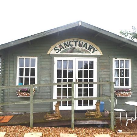מורפת' Owls Nest Log Cabin מראה חיצוני תמונה